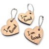 Christelijke-Cadeautjes-uitdeelcadeautjes-sleutelhangers-hartjes-je-bent-geliefd-set-van-3-hout-tashanger-i-am-loved I am loved - Set van 3 sleutelhangers